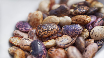 A closeup of dry colorful pinto beans