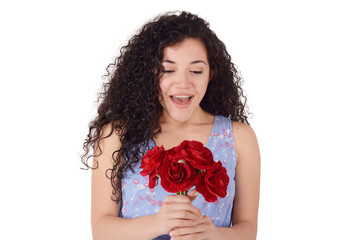 Portrait of surprised young woman with bunch of flowers