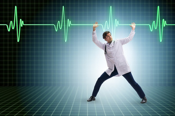 Doctor cardiologist supporting cardiogram heart line
