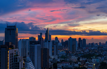 urban cityscape with sunrise sky and cloudscape