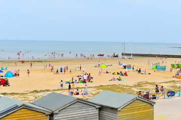 Beachgoers making the most of the sunshine at Minnis Bay over the weekend. Birchington, Kent,...