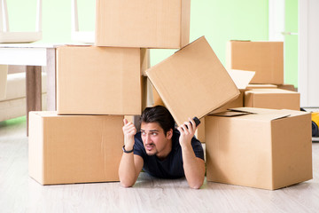 Man moving house with boxes