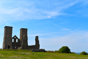  The imposing twin towers of the medieval church at Reculver, Herne Bay, Kent, England, August, 2018