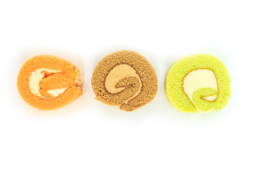 green chocolate orange cake roll on white background.