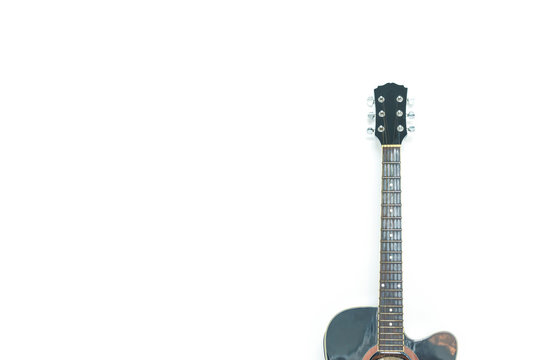 black guitar classic on white background.