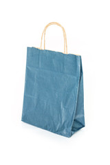 blue paper bag on white background.