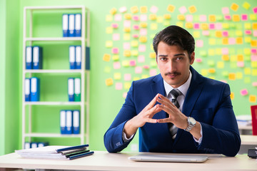 Businessman with many conflicting priorities   