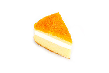 Slice of delicious orange cake on white background.