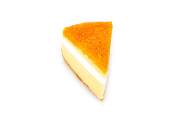 Slice of delicious orange cake on white background.