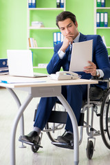 Disabled businessman working in the office