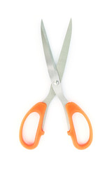 orange scissors cutting on white background