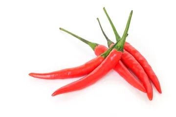 Fotobehang heap chili pepper red spicy on white background © angintaravichian