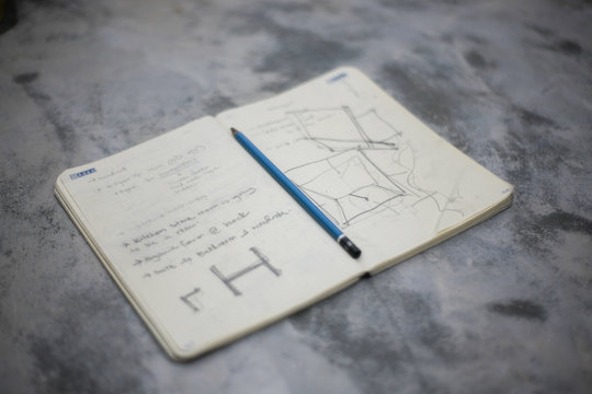 sketchbook of an architect with blue pencil