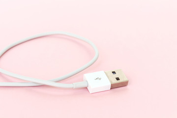 Fototapeta premium usb cable port charger on pink background