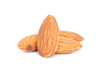 heap almonds on white background.