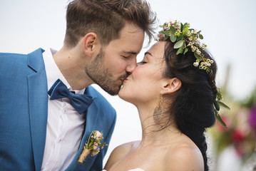 Young couple in a wedding ceremony at the beach