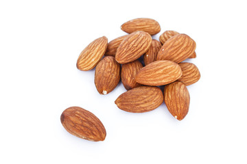 heap almonds on white background.