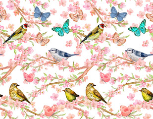 Obraz premium pretty seamless pattern with birds on twigs of flowering cherry and butterflies. watercolor painting