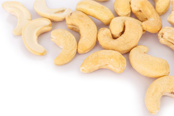 heap cashews on white background.