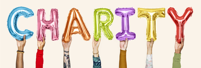 Colorful alphabet balloons forming the word charity