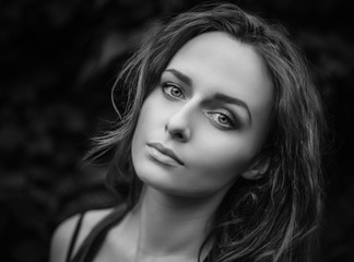 Outdoors portrait of beautiful young woman. Selective focus.