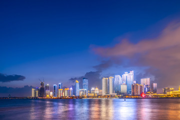Fototapeta na wymiar The night scene of urban architectural landscape in Qingdao