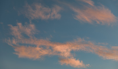 Sunset sky with orange clouds. Nature background.