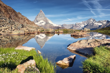 Matterhorn and reflection on the water surface at the morning time. Beautiful natural landscape in the Switzerland