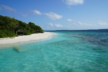 View along a beach in Baa Atoll, Maldives