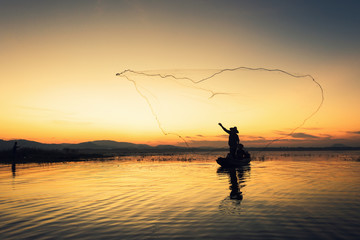 Silhouette of fishermen