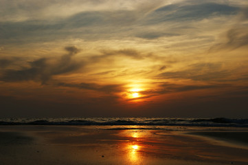 Fototapeta na wymiar Sunset on the beach of Goa. Arambol beach, Goa, India