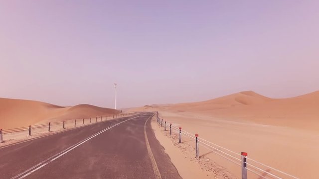 New road from Oasis Liwa to Moreeb Dune in Rub al Khali desert stock footage video