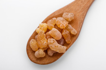 fragrant frankincense on a white acrylic background