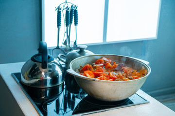 On The electric stove cooks food
