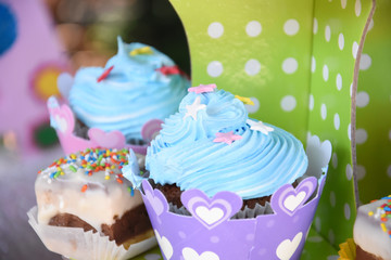 Sweet table for child birthday. Candy bar with a lot of different candies and sweet cakes