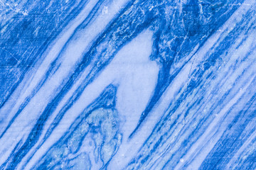 The background or texture of the marble wall of the quarry or opencast. The surface of the marble...