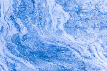 The background or texture of the marble wall of the quarry or opencast. The surface of the marble...