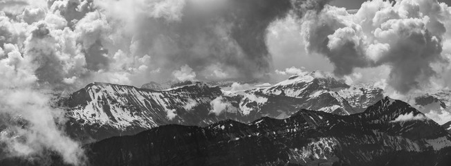 Black and white, alps and clouds