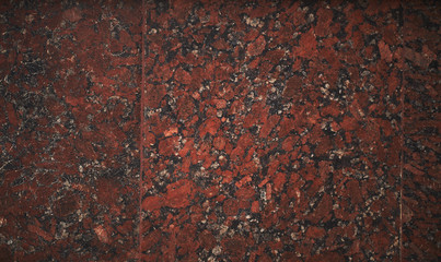 Polished red granite texture