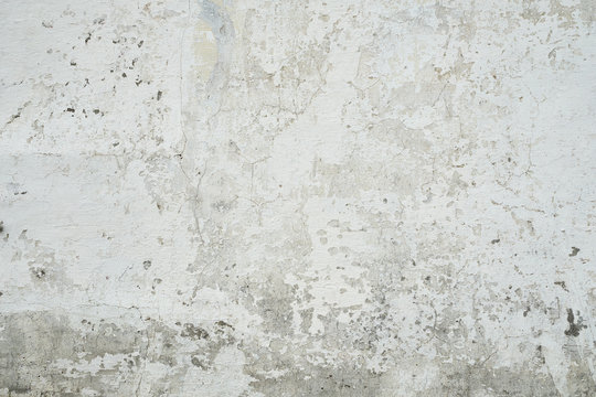 cracked cement wall background © spaxiax