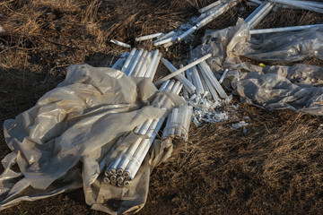 Ecological problem, disaster. Criminal disposal of fluorescent mercury lamps, E-waste. Environmental pollution. Ecological crime. Dirty broken fluorescent lamps, old fluorescent lamp dangerous rubbish