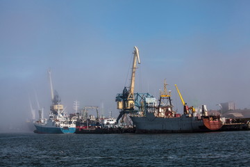 Fototapeta na wymiar Fog in Klaipeda sea port