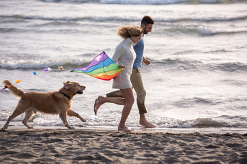 happy couple enjoying time together at beach