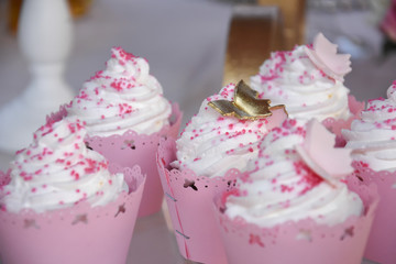 Sweet table for child birthday. Candy bar with a lot of different candies and sweet cakes