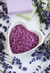 Plakat Heart-shaped bowl with sea salt, soap and fresh lavender flowers