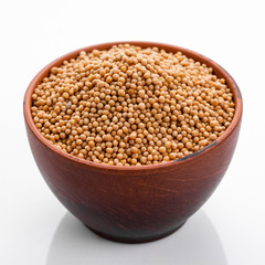 fragrant grains of mustard on a white background