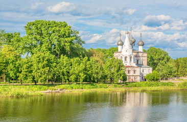 Fototapeta na wymiar Ancient Church of St. John Chrysostom on the banks of the river in Vologda