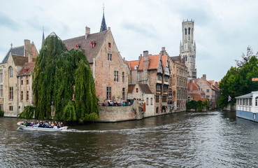 Canal and famous Belfry tower in the historic center of Bruges, Belgium