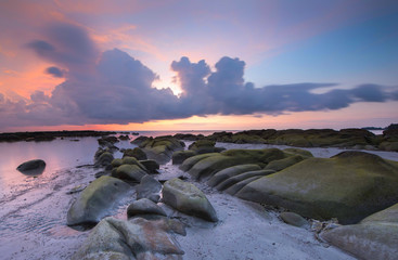 Beautiful clouds during sunset at Unknown Beach in Sabah, Malaysia. soft focus due to long expose.