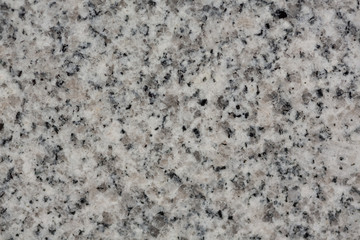 Natural granite background in classic light tone.
